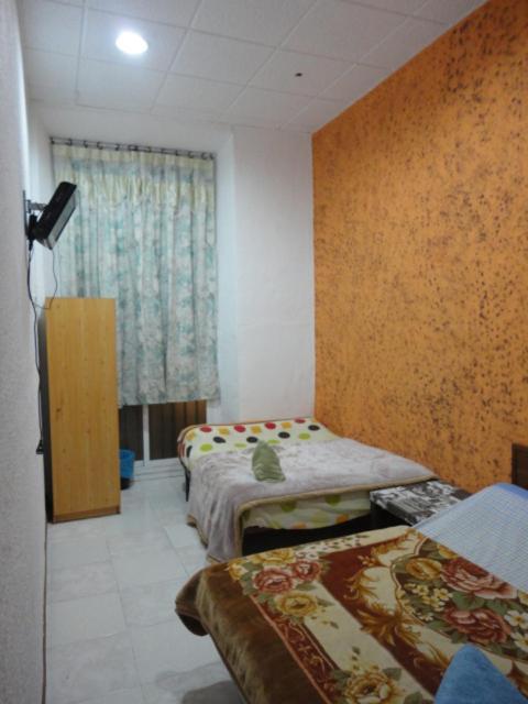 Camera Quadrupla con Bagno in Comune